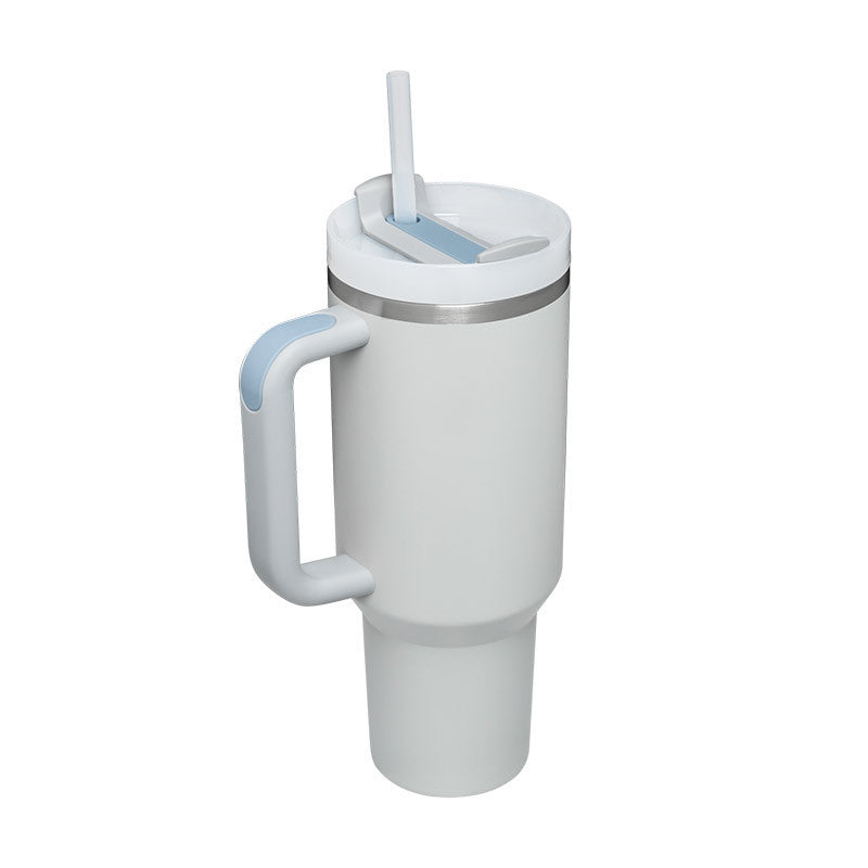 Vacuum sealed thermal tumbler with ergonomic handle design